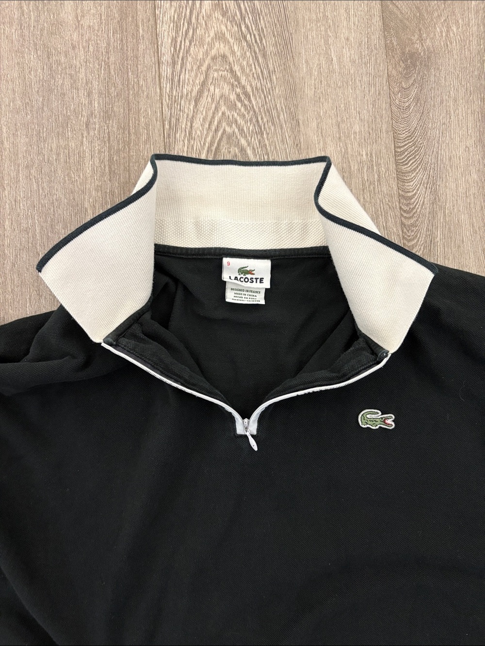 Lacoste Black Zip-Front Polo with White Contrast Collar